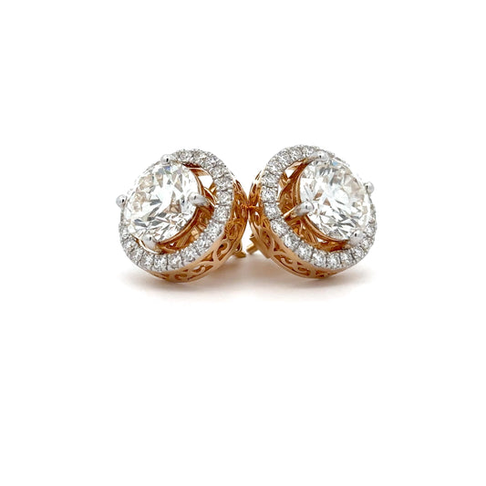 Centre Solitaire Round Diamond 4-prong basket Setting & Side Round Diamonds Channel Setting Stud Earring