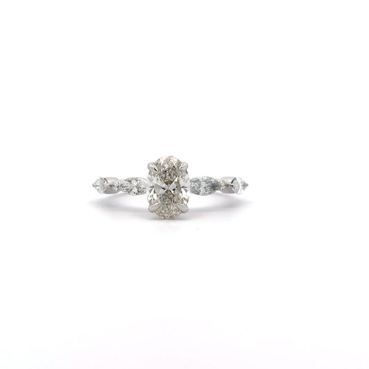 Centre Oval Shape Solitaire Diamond & Marquise Side Diamonds Ring