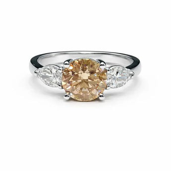 Elegant 4.24 Carat Diamond Engagement Ring - Round and Pear Trilogy