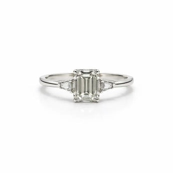 4 Carat Emerald-Cut Diamond Three-Stone Ring