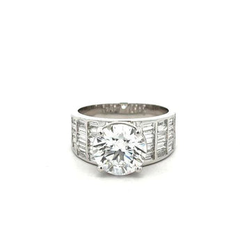 7.797 Carat Round Cut Diamond Ring with Baguette Side Stones