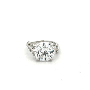 Modern 5.393 Carat Diamond Solitaire Ring with Artistic Side Motif