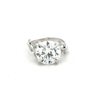 Modern 5.393 Carat Diamond Solitaire Ring with Artistic Side Motif